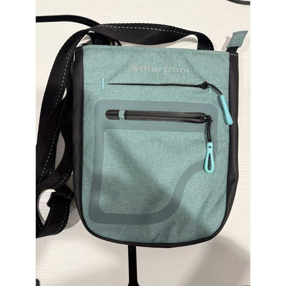 SHERPANI  Anti-Theft Crossbody Shoulder Travel Bag NWOT Teal Green Black Trim